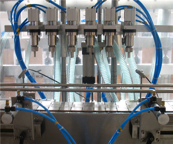 Sešu galvu automātiska šķidruma iepildīšanas mašīna